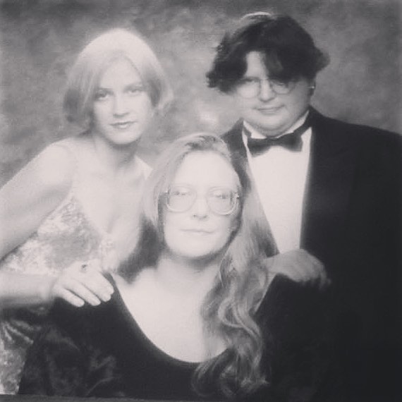 photo of a black and white Glamour Shots photo with my mom and brother from 1994
